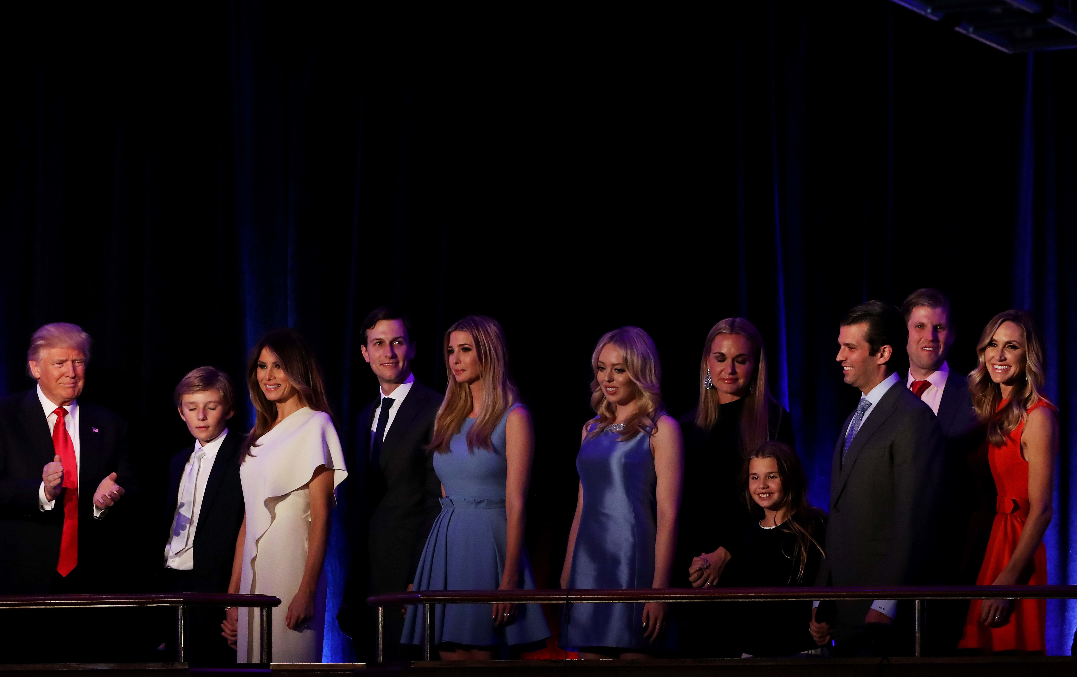 Donald Trump, supported by his family, makes his acceptance speech after winning the US presidential election.