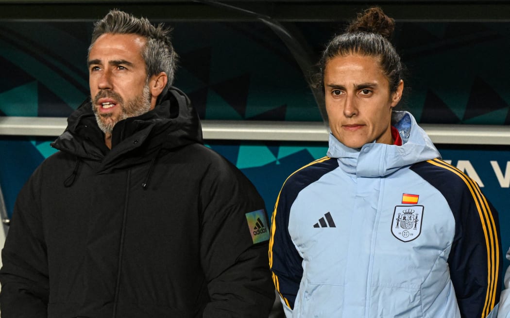Spain's coach Jorge Vilda (L) looks on next to Spain's Montse Tome during the 2023 Women's World Cup.