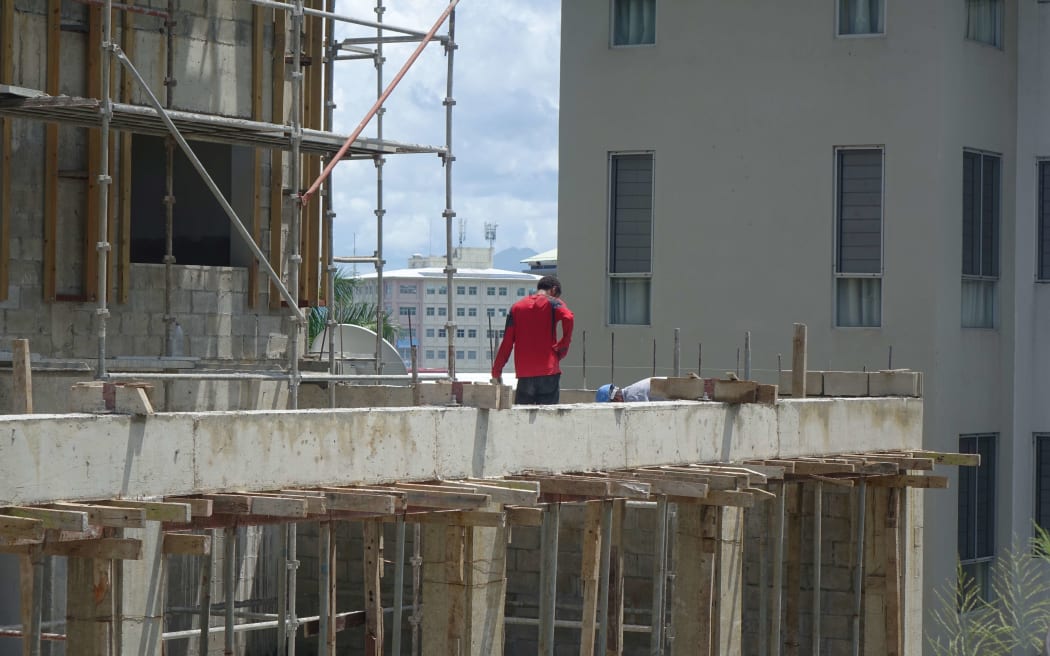 Workers on a construction site in Fiji's capital, Suva.
