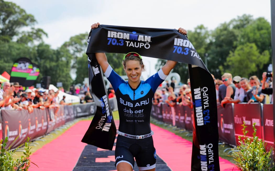 Hannah Wells wins Ironman 70.3 in Taupo in 2019.
