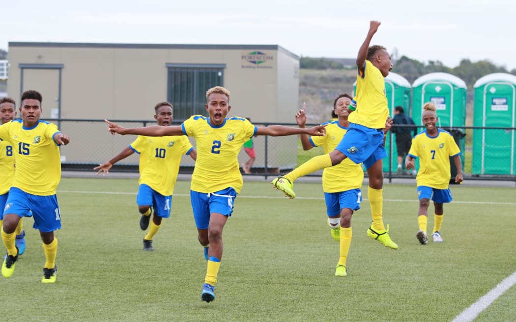 The Solomon Islands under-15 team celebrating a win at the OFC Under-15s development tournament in Auckland.