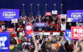 Former US President and 2024 presidential hopeful Donald Trump speaks during a campaign rally in Green Bay, Wisconsin, on 2 April, 2024.