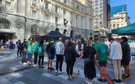 Group pay respects where Efeso Collins died - singing waiata led by Dave Letle