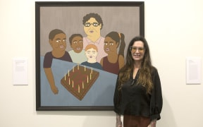 Judge Fiona Partington with the winning artwork 'Nana's Birthday'.