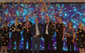 Ampol chief executive Matt Halliday rings NZX bell