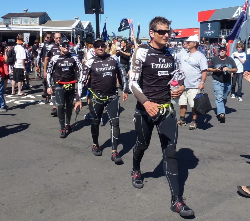 Dean Barker, tactician Ray Davies and wing trimmer Glenn Ashby before race 16.