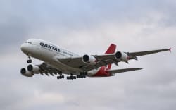 Qantas Airbus A380 aircraft as seen flying and landing at London Heathrow Airport LHR. The wide body double-decker Airbus A380 aircraft has the registration VH-OQH, the name Reginald Ansett and is powered by 4x Rolls Royce RR jet engines. The specific passenger plane was stored for 2 years due to the Covid-19 Coronavirus pandemic. Qantas Airways Limited is the flag carrier of Australia, the world’s third oldest airline in operation and member of Oneworld aviation alliance group. The main hub for the Australian airline is Sydney airport. London, United Kingdom on August 2022 (Photo by Nicolas Economou/NurPhoto) (Photo by Nicolas Economou / NurPhoto / NurPhoto via AFP)