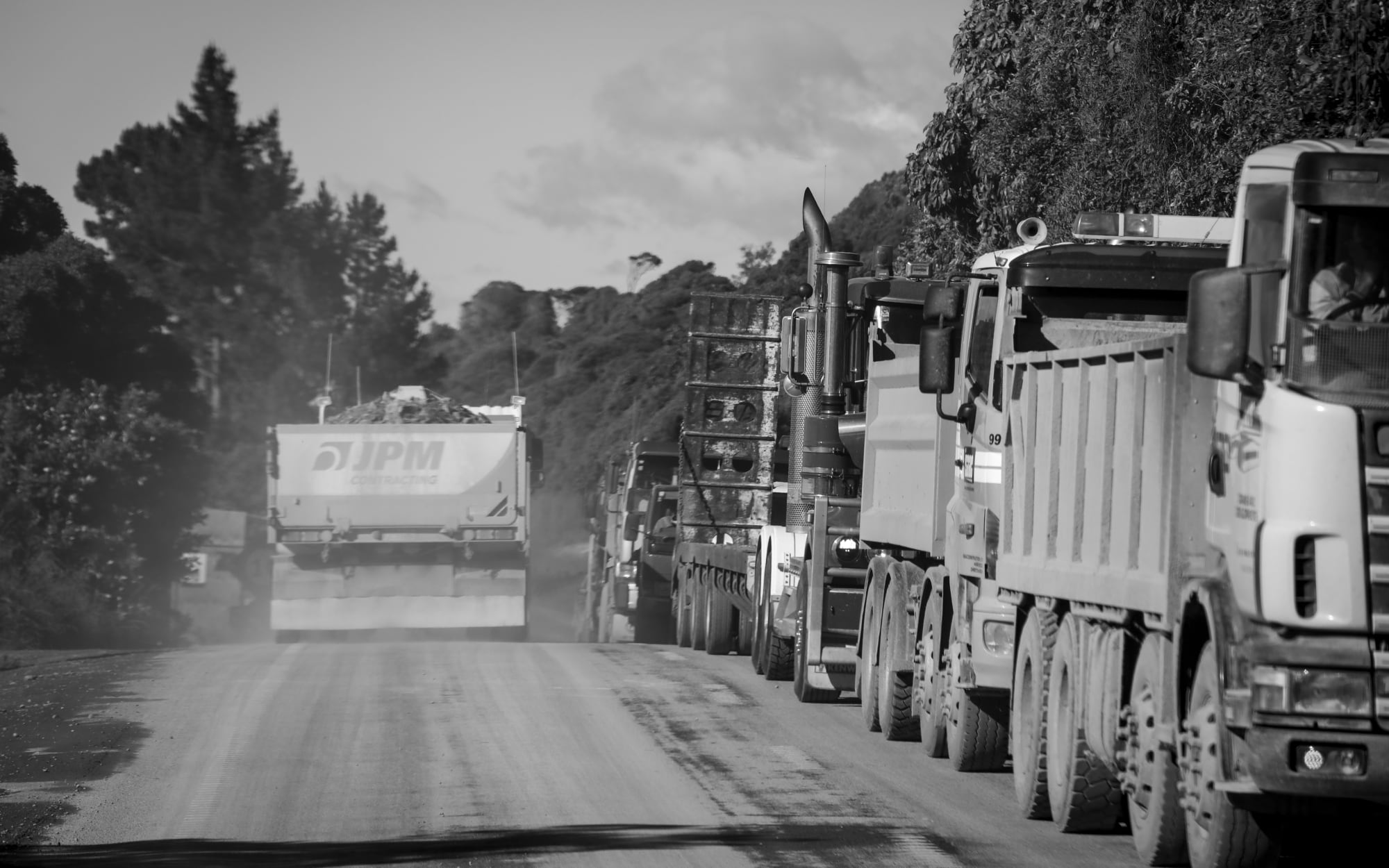 Hundreds of trucks and heavy machinery line the road along the coast. SH1 north of Kaikoura is due to open on December 15th.