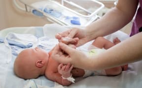 The group Action to Improve Maternity wants the Health Minister to implement each of the Coroner's recommendations.