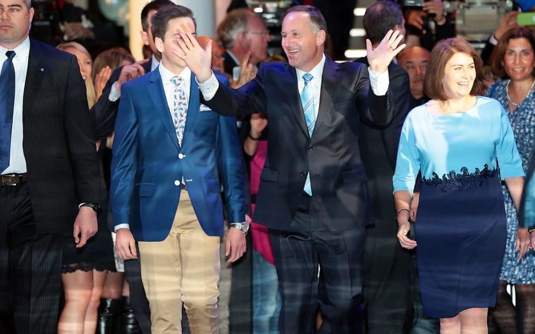 John Key in celebratory mood.