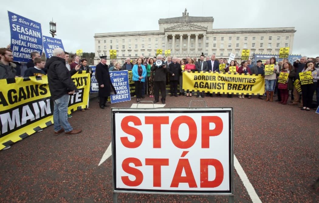 Members of the anti-Brexit campaign group "Border communities against Brexit" outside Parliament Buildings, the seat of the Northern Ireland Assembly on the Stormont Estate, Belfast.