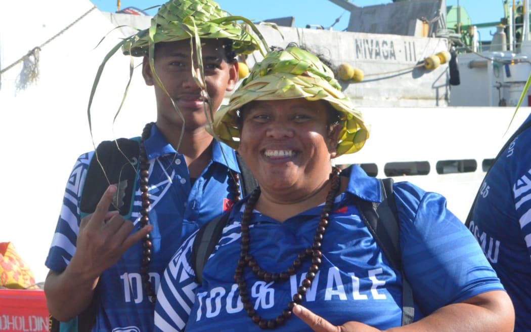 From Pukapuka – Te Ulu O Te Watu, Tarai Ngarima and her son Junior Ngarima beam with joy after arriving for Te Maeva Nui.