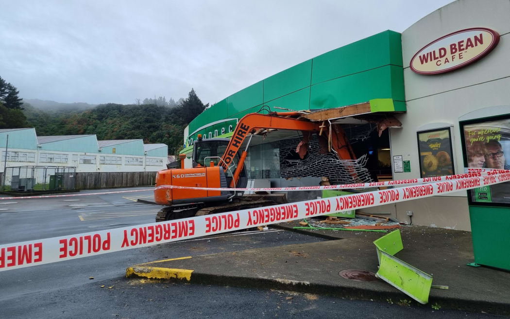 A BP service station in Wainuiomata with the bucket of a digger in the front after it was raided using an excavator taken from a building site.
