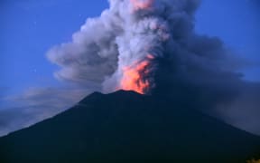 Mount Agung erupts.
