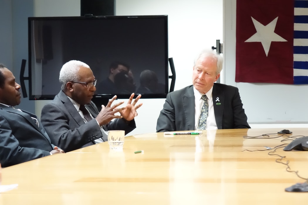 The secretary-general of the United Liberation Movement for West Papua, Octo Mote, talks to New Zealand MPs.