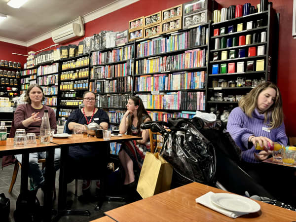 Auckland Romance Readers Book Club members discuss a book.