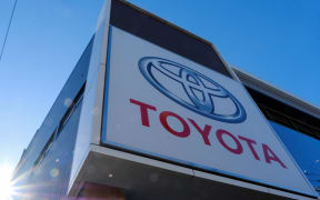 The logo of Japan's Toyota Motor is displayed at a dealership in Tokyo on 9 February, 2022.