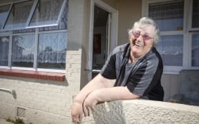 Mary Smith is delighted her new window has been installed in her council flat.