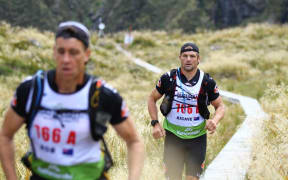 Richie McCaw and Rob Nichol on the Coast to Coast run