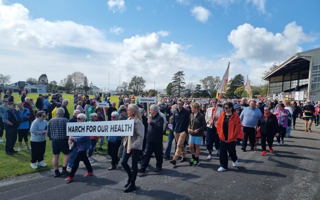 About 1000 people have turned out to protest against the health system in Westport.