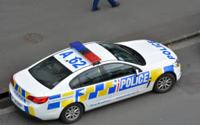 AUCKLAND - MAR 30 2017:New Zealand Police car and officer during a crime respond in Auckland, New Zealand.