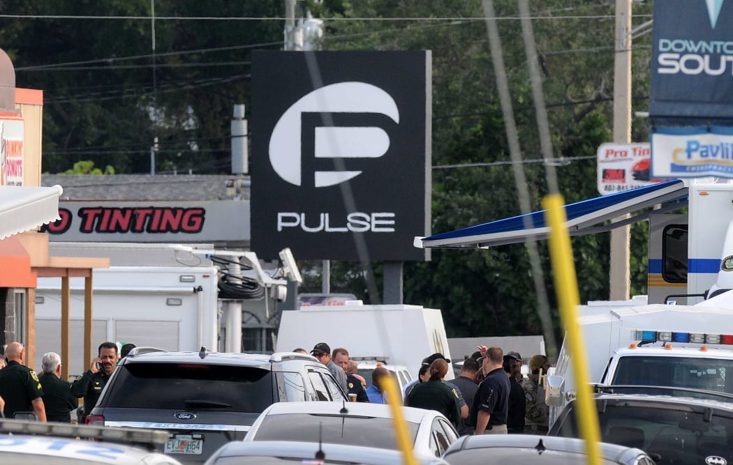 Orlando police officers seen outside of Pulse nightclub after a fatal shooting and hostage situation on June 12, 2016 in Orlando, Florida.
