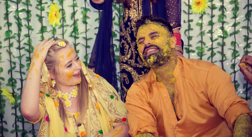 At the Mahiyn (Vatna), the first of their Indian wedding events. The bride and groom are covered in yoghurt and tumeric paste, a ritual to cleanse and purify you before your big day.