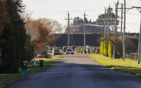 The scene of a crash where four people died after a truck and van collided near Ashburton.