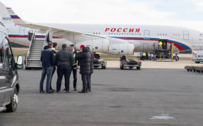 The diplomats left on a Russian aircraft on New Year's Day.