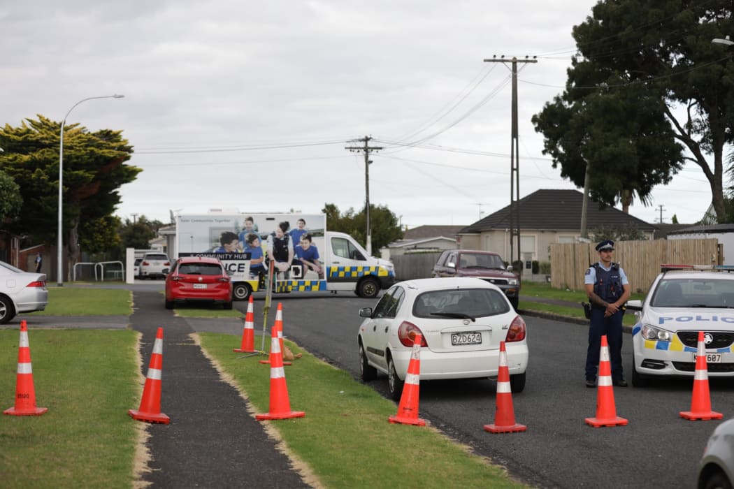 A cordon in Papatoetoe after a man was shot by police.