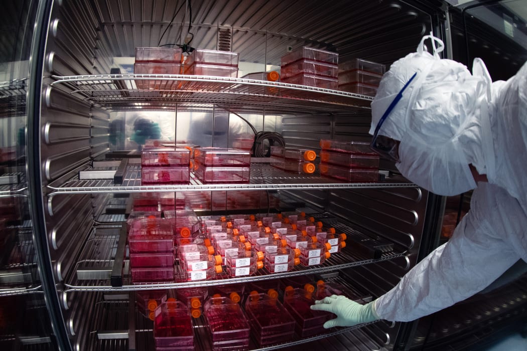 A lab technician testing potential vaccines at a lab in France. The company, Sanofi, is testing to find a vaccine for Covid-19.