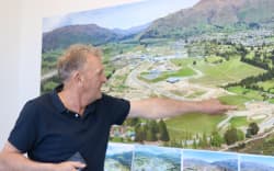 Three Parks developer Allan Dippie pointing out the location of the proposed restaurant.