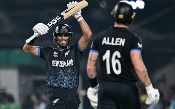 Rachin Ravindra (L) and Finn Allen celebrate the Black Caps' win over South Africa in 2026 ICC Men's T20 Cricket World Cup semi-final match in Kolkata on March 4, 2026. (Photo by Arun SANKAR / AFP)