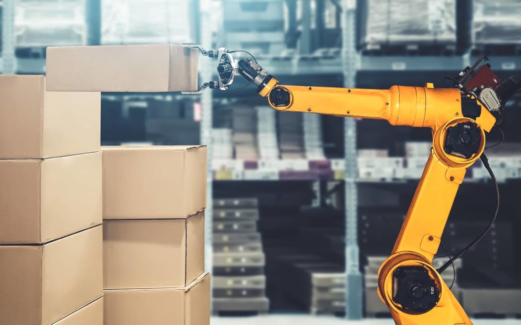 Smart robot arm system for innovative warehouse and factory digital technology . Automation manufacturing robot controlled by industry engineering using IOT software connected to internet network .