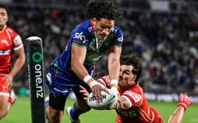 Dallin Watene-Zelezniak of the Warriors dives to score a try, NZ Warriors v Dolphins.