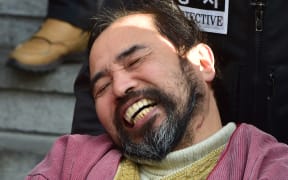 South Korean political activist Kim Ki-Jong in police custody after slashing US Ambassador Mark Lippert.