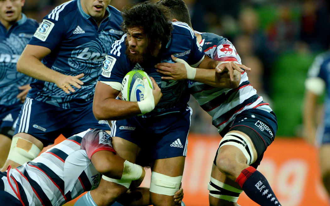 Stand-in Blues skipper Steven Luatua battling against the Rebels