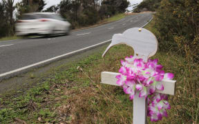 In Rangitane, near Kerikeri, local residents place roadside crosses where kiwi have been killed by cars. Photo: Peter de Graaf