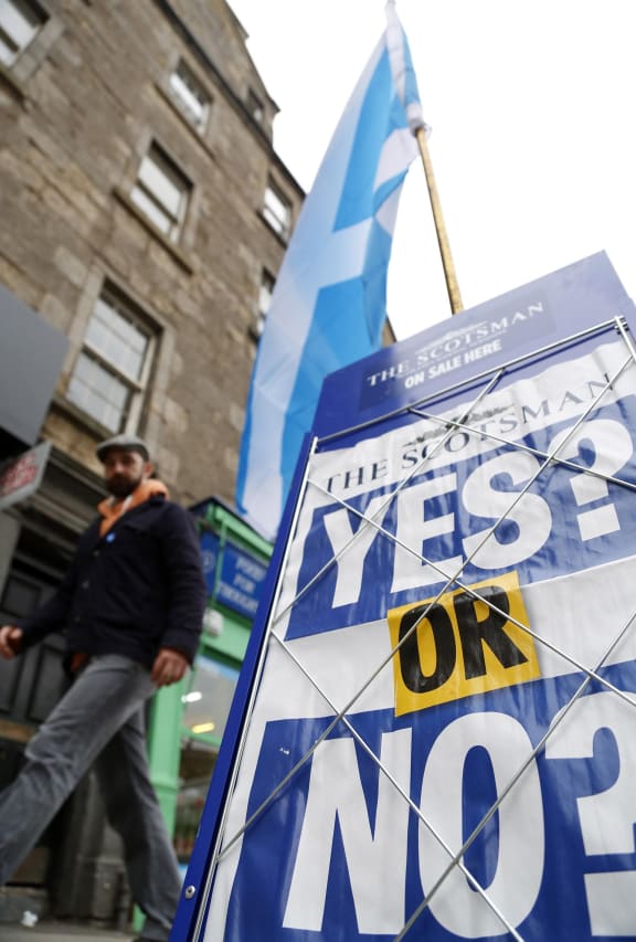 "Yes or No" poster is seen during voting for Scottish independence referendum on September 18, 2014 in Edinburgh, Scotland. Scottish voted against becoming independent from Britain in a referendum.