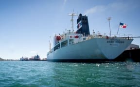 The Asian Adonis loading at the Port of Tauranga