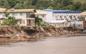 Houses teetering on the banks of the Mataniko River in Honiara.