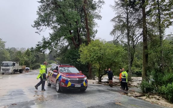 Police at a flooded property on Whareora Road in Whangārei during Cyclone Gabrielle. 14/2/23