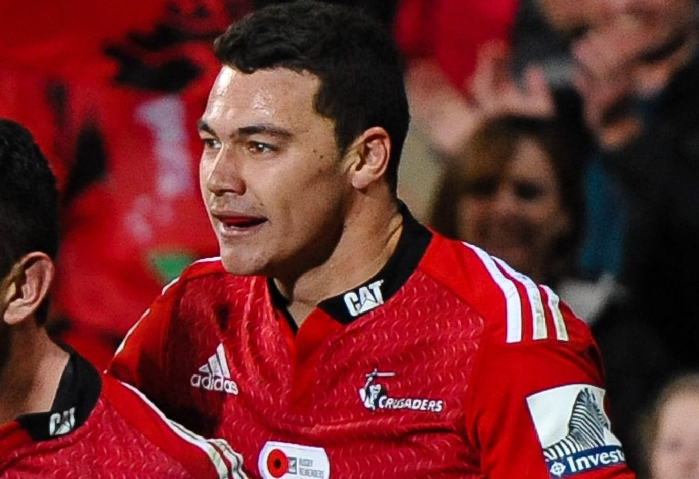 Codie Taylor of the Crusaders celebrates his try with team-mate David Havili.