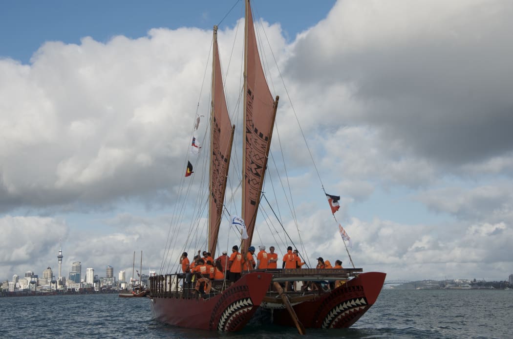 Waka Quest voyaging canoe Haunui sailing in the Waitemata Harbour.