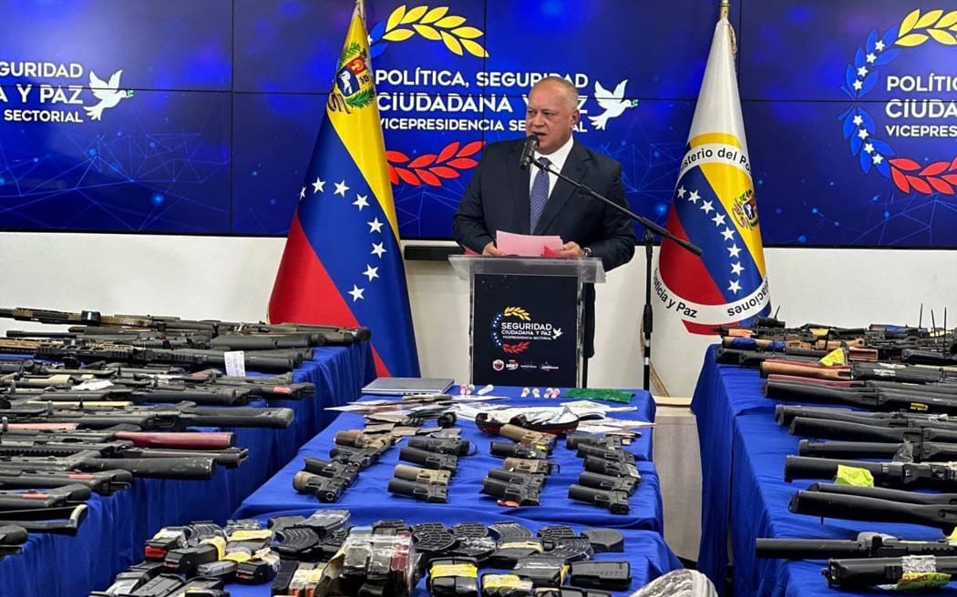Venezuela’s Interior Minister Diosdado Cabello announces foreigners are being held on suspicion of trying to destabilise the country, and displays weapons seized by authorities, in Caracas on 14 September, 2024.