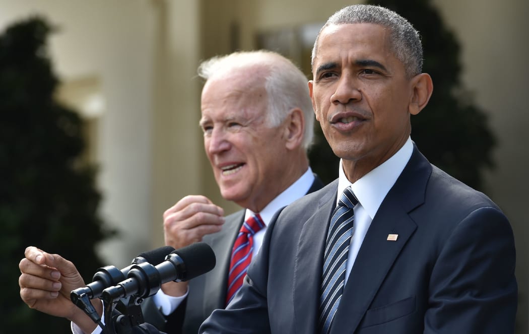 President Barack Obama,  with Vice President Joe Biden, at left) addresses the nation after Donald Trump's election victory.