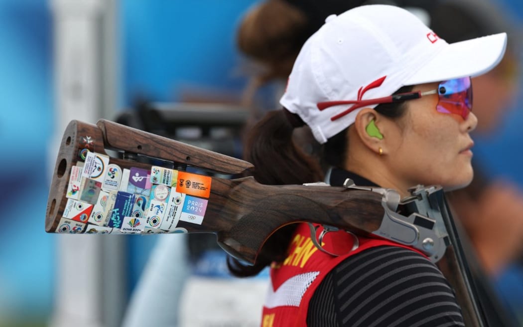 (240804) -- CHATEAUROUX, Aug. 4, 2024 (Xinhua) -- Wei Meng of China is seen during the skeet women's qualification of shooting at the Paris 2024 Olympic Games in Chateauroux, France, Aug. 4, 2024. (Xinhua/Zhao Dingzhe) (Photo by Zhao Dingzhe / XINHUA / Xinhua via AFP)