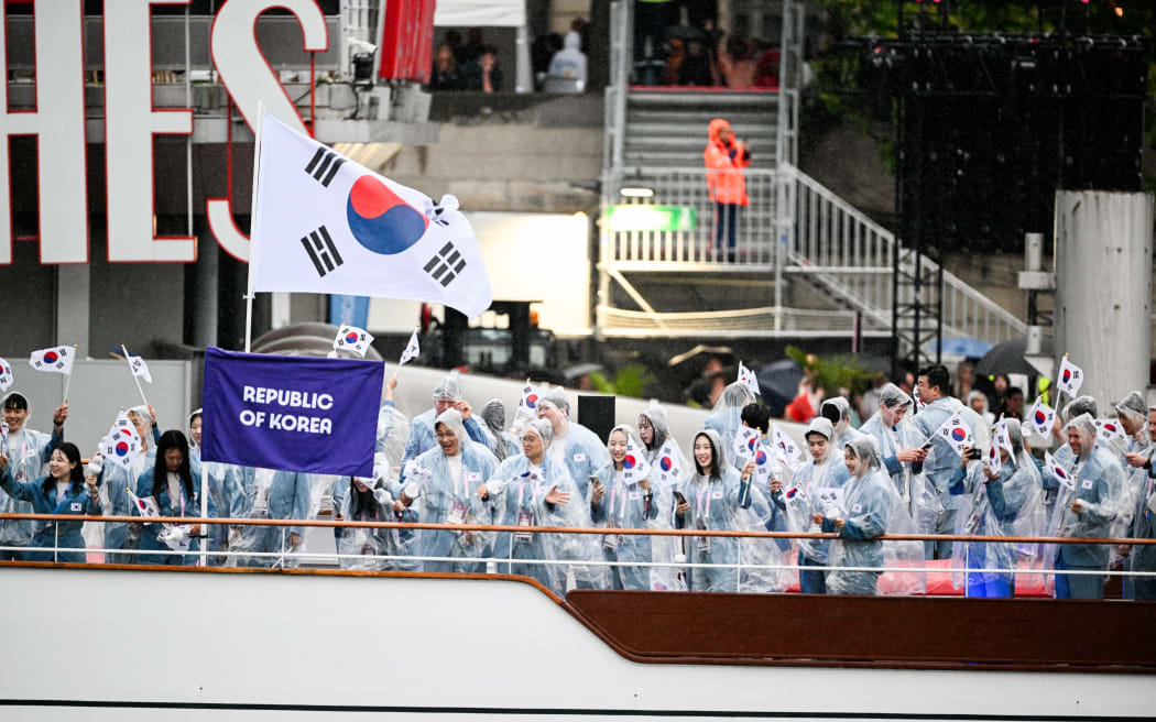 Team South Korea pictured on the boat during the opening ceremony of the Paris 2024 Olympic Games, on the Seine river.