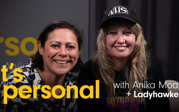 Ladyhawke joins Anika Moa in studio for season two of It's Personal. The words "It's Personal" appear in yellow and bold, with the words "with Anika Moa + J Ladyhawke" in white.