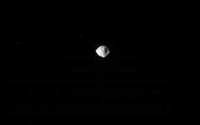 This animated GIF built with unprocessed raw images show's Cassini close pass by Saturn's moon Atlas.